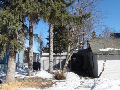 View of current garage from street