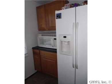 Kitchen. Refrigerator and microwave will not stay.