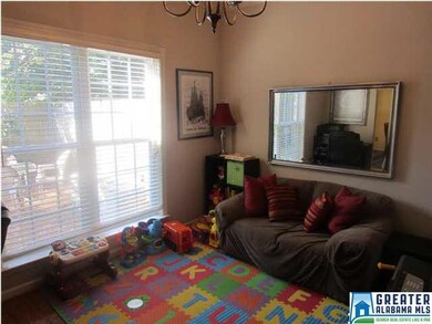 Separate dining room with hardwood flooring