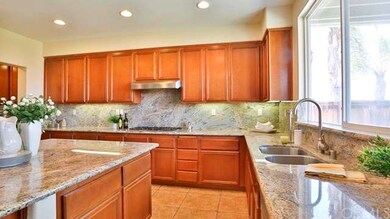 Upgraded Kitchen with Granite Counters & Backsplas