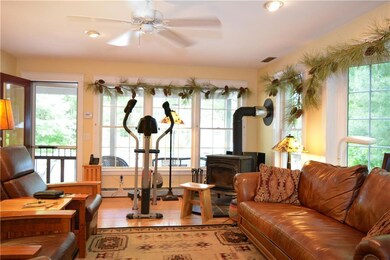 Family room with wood stove and...