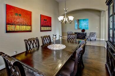 Another view of the formal dining room showcasing the extended entry to the family area.