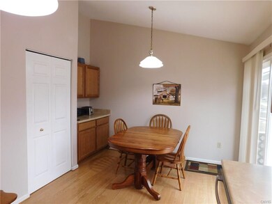 Eat in kitchen with additional cabinet space and p