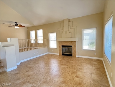 Unfurnished living room with vaulted ceiling, ceil