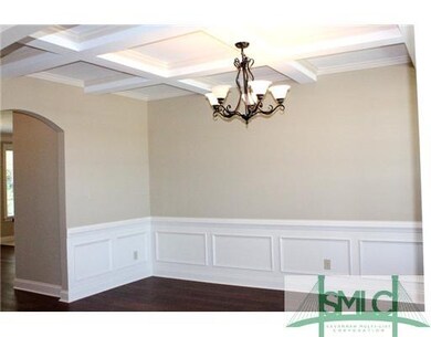 Dining Room. Formal dining room with coffered ceil