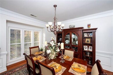 Dining Room w/crown molding and plantation shutter