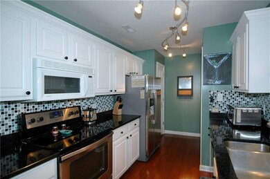 Beautifully updated, the kitchen offers easy maint