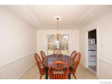 Dining Room with beautiful tray ceiling.