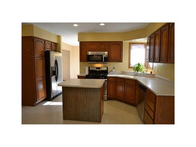 Kitchen. Bright sunny kitchen with center prep isl