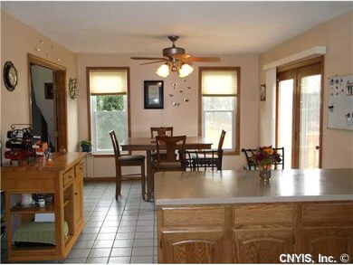 Kitchen Eat in kitchen - french doors leading out 