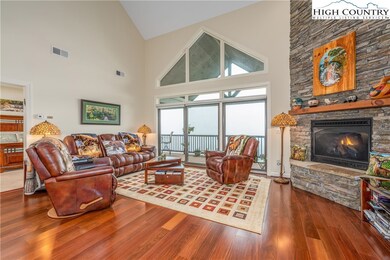 Beautiful flooring, leather recliner sofa and chai