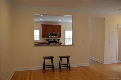 Kitchen open to dining room.