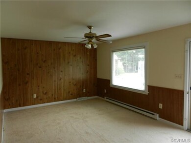 Living room with new paint and carpet