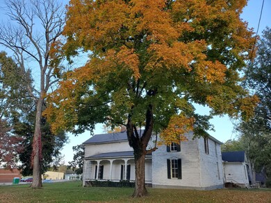 Lovely Setting Features Mature Trees!  Wonderful View in Every Season!