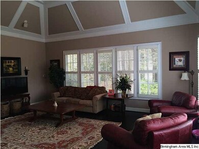 Great Room with vaulted ceilings, stone fireplace,