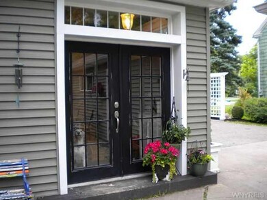 Exterior Back. Back entrance to foyer and laundry 