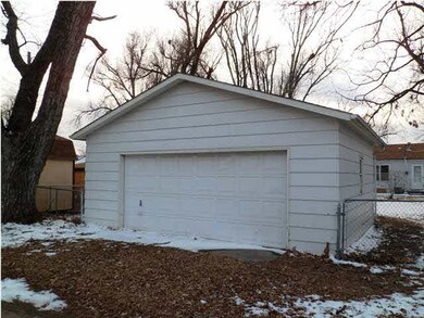 2 car detached garage that is accessed from the al