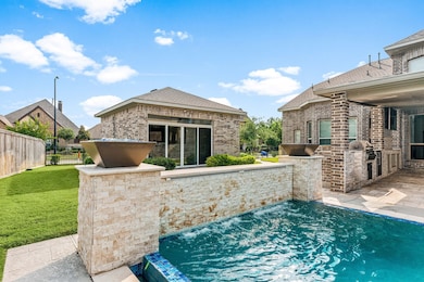 This photo showcases a modern backyard with a swim