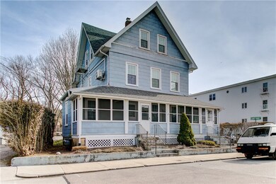 Front View with view of three-season wrap around porch