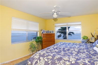 Bedroom featuring tile patterned flooring, a ceili