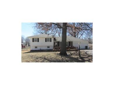 Shingle siding and brick veneer