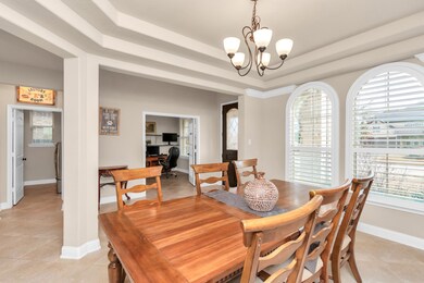 Formal dinning with view of study entrance