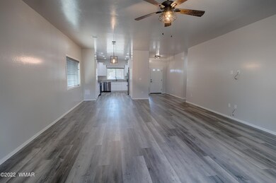 Great Room into Kitchen + Dining
