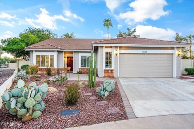 9005 E Lupine with 2 car garage