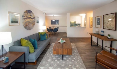 Living room featuring dark hardwood / wood-style f