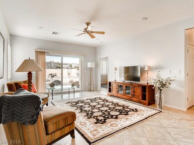 Spacious Family Room with Diagonal Tile, Shutters,
