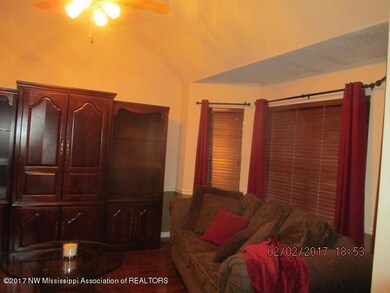 Great room with vaulted ceiling