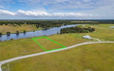 Drone / aerial view featuring a water view and a r