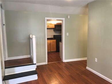 Stairs to upstairs bedroom and full bath