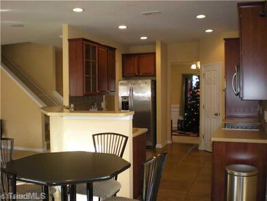 Breakfast. Tiled Breakfast area opens to kitchen and family room~ No one is left out of the conversation!