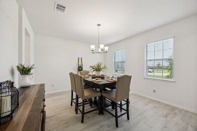 Another view of the spacious dining. This could al