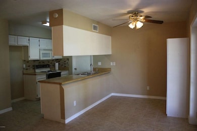 Family room view to dining-ktichen