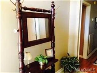 Entrance foyer has enough room for a piece of furn