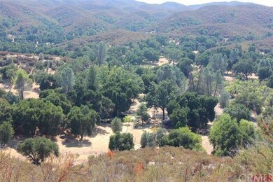 View from hill of cabin location