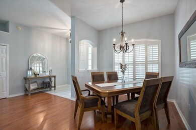 Cool contemporary color palates with laminate  WOOD floors in many main rooms and PLANTATION SHUTTERS everywhere! ( approx. $25,000),