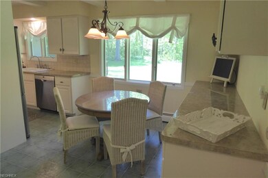 As you enter the kitchen, the cozy dinette is perf