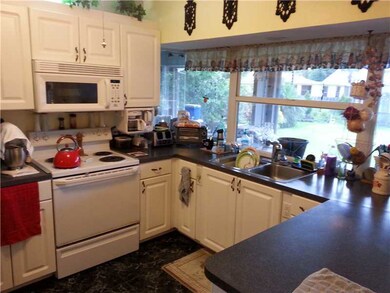Kitchen. Space saving kitchen with custom windows.