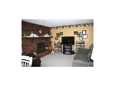 Main floor family room with fireplace