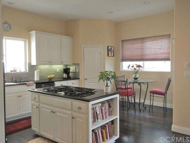 Nicely Sized Kitchen with Island and Walk-in Pantr