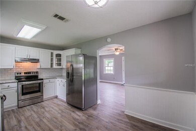 Breakfast nook in the kitchen with large windows, 