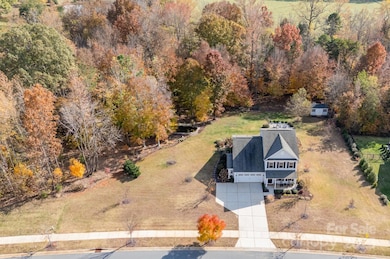 Quiet, low-traffic neighborhood with sidewalks and wide lots.