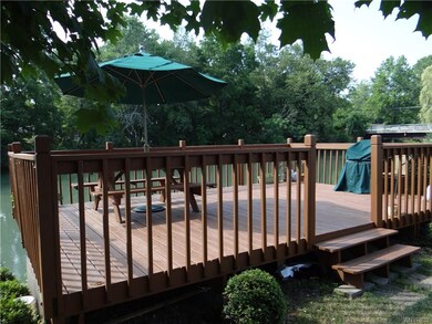 Large common area deck includes a picnic table wit