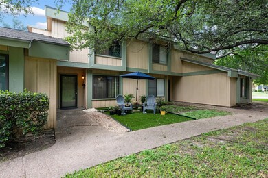 View of front of home with roof with shingles