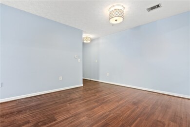 This 1st floor condo features LVP flooring through