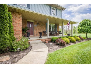 RELAX ON THIS INVITING  FRONT PORCH