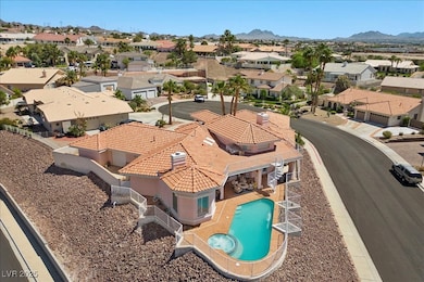 Aerial perspective of suburban area with a mountai